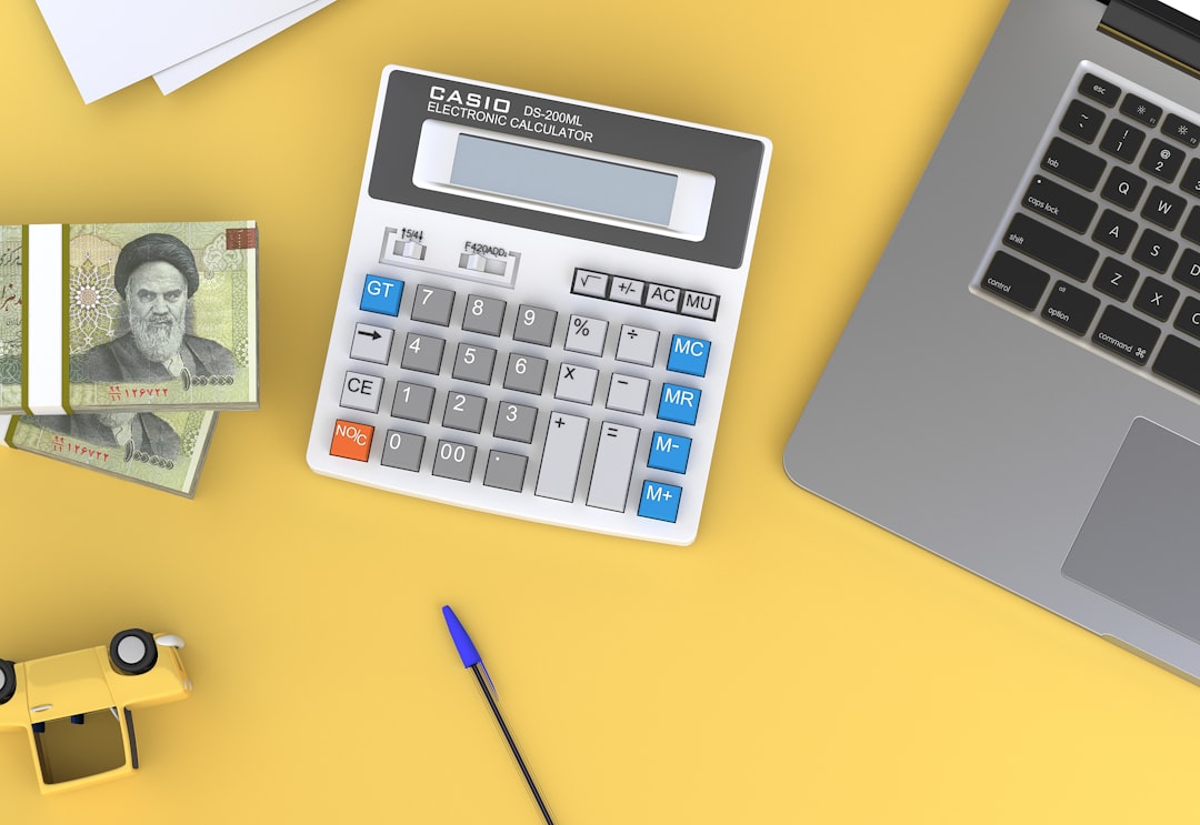 zero-based budget cover illustration with calculator, receipts, envelopes, and a spreadsheet